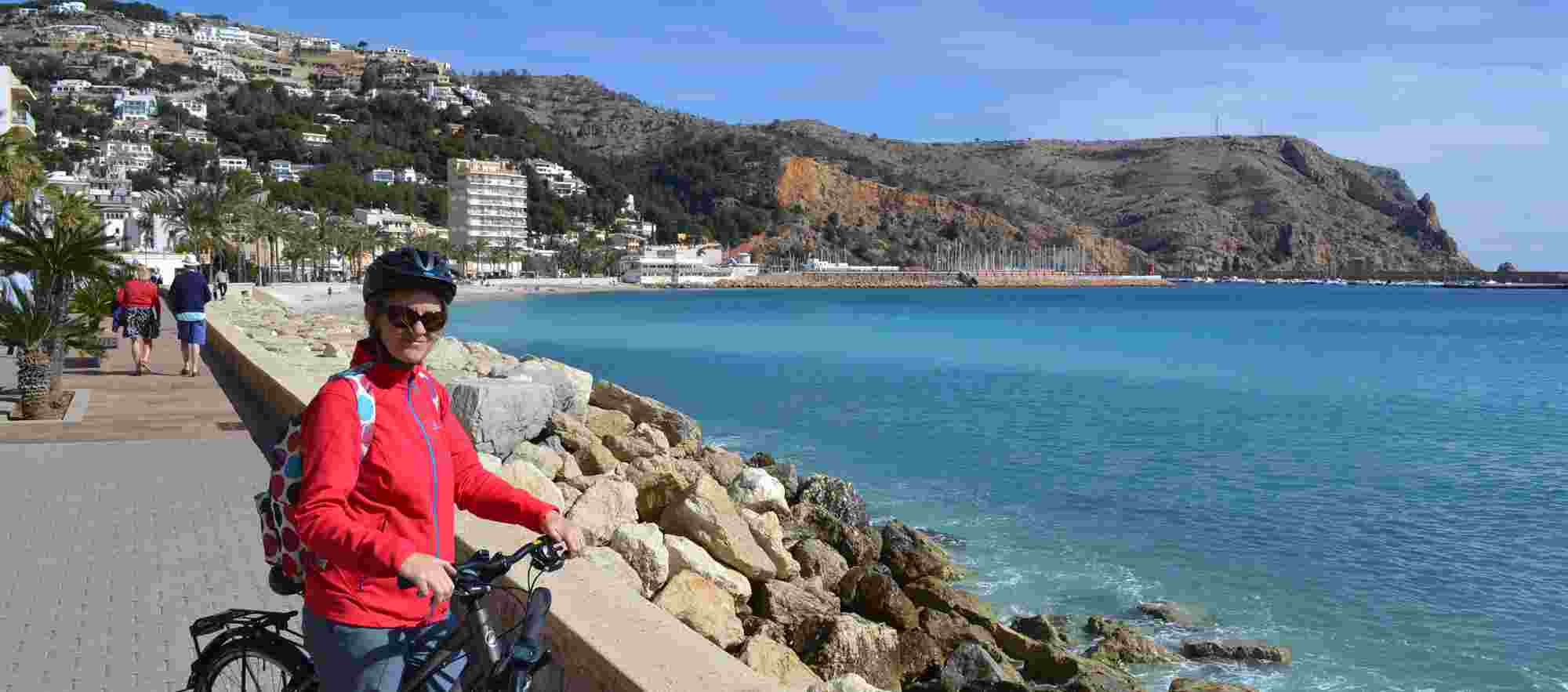 Cyclist at the beach in Javea, Alicante