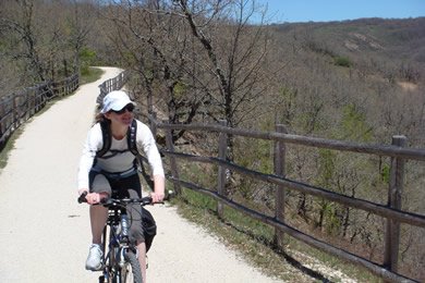 cyclist on the via verde de la sierra de la demanda